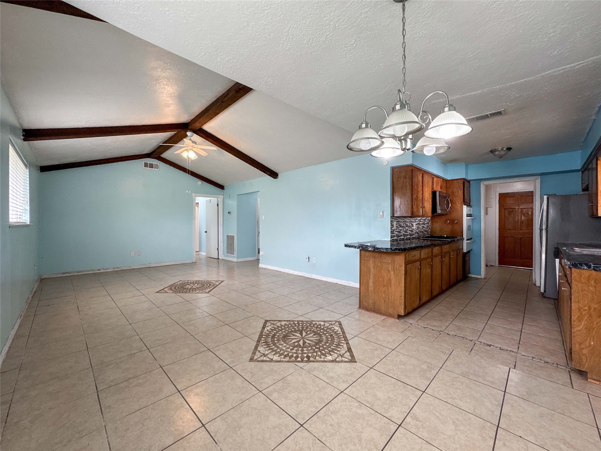 4522 Sage Circle Baytown, TX 77521 - Photo 8 of 33 a view of a kitchen with a sink cabinets and window
