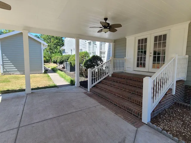 a view of a house with porch and wooden floor