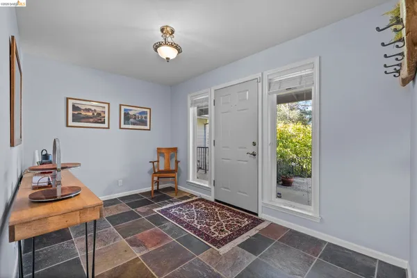 a room with furniture and window