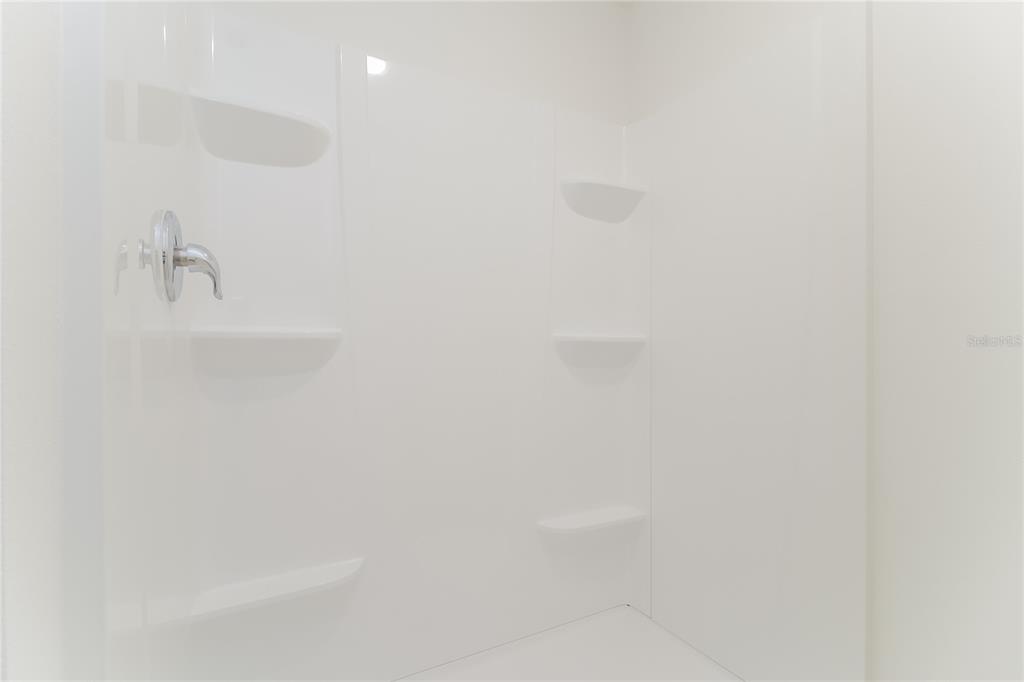 1187 Moyle Way Mascotte, FL 34753 - Photo 13 of 16 a close view of shower tap