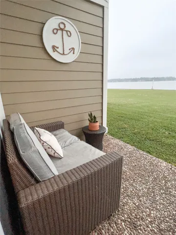 a bedroom with a bed and a wall painting