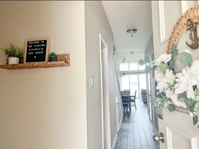 a view of entryway with wooden floor