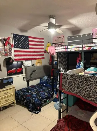a room with lots of furniture and clutter