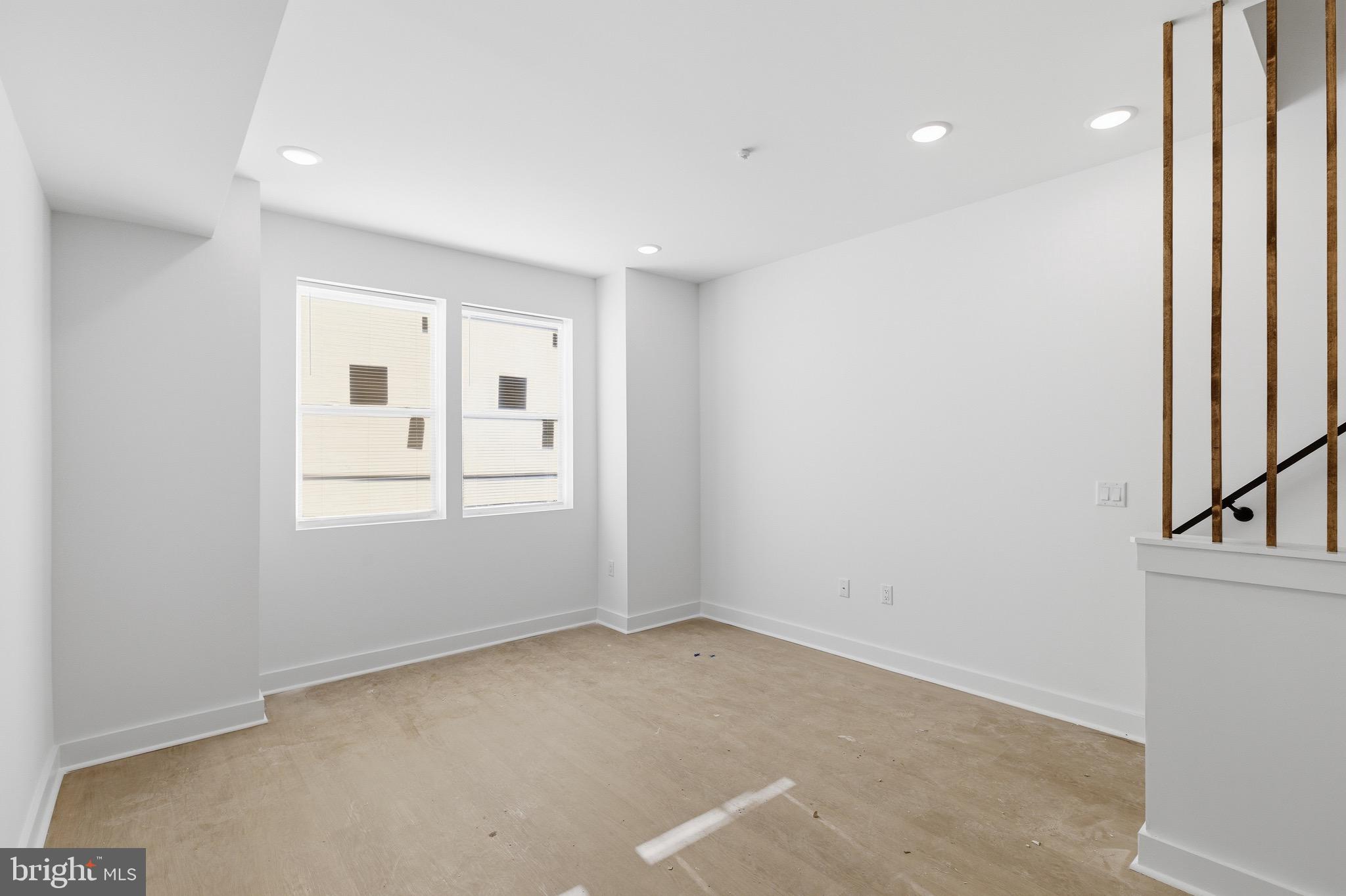 2116 North 7th Street, Unit 2 Philadelphia, PA 19122 - Photo 12 of 21 an empty room with windows
