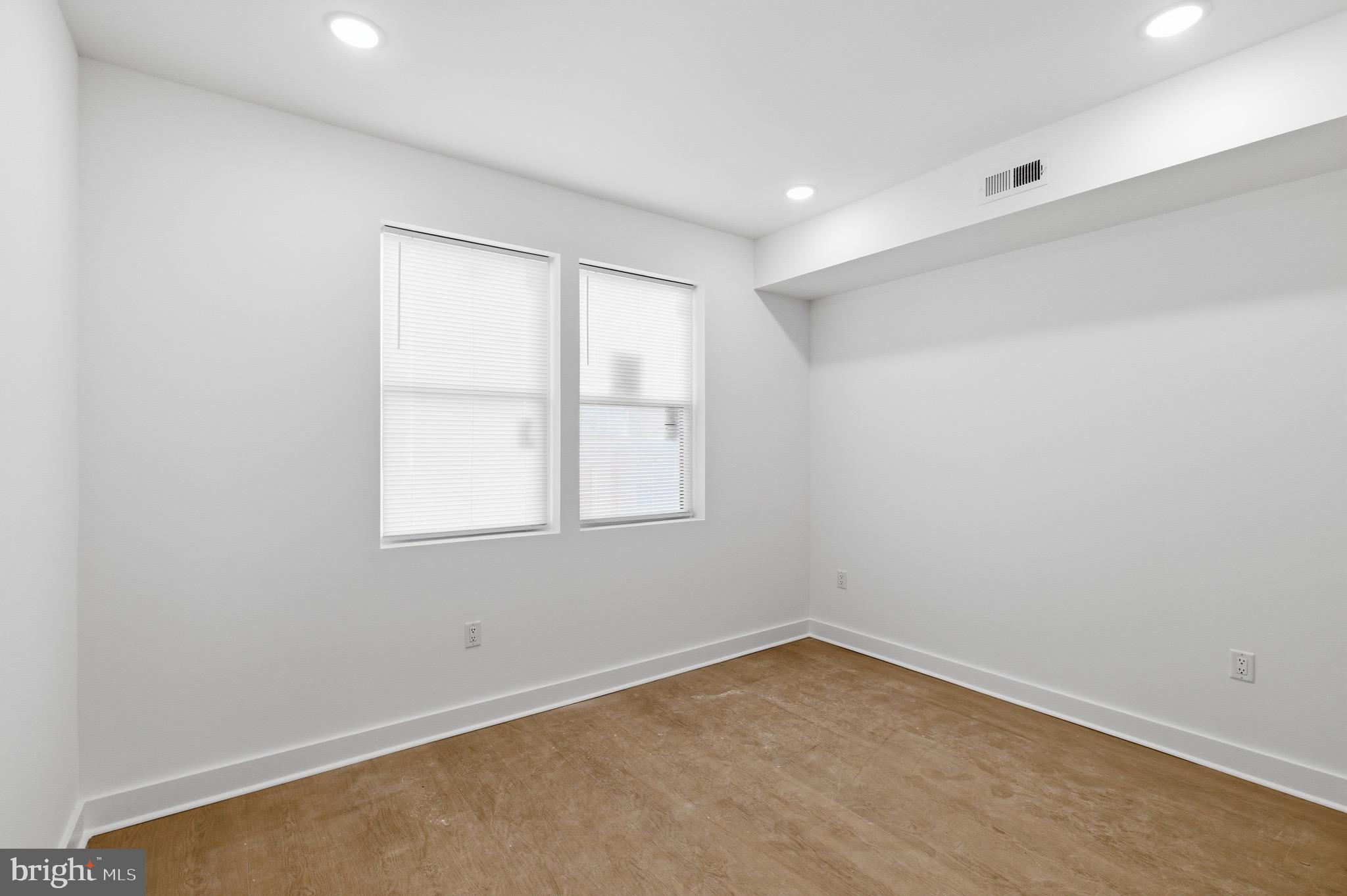 2116 North 7th Street, Unit 2 Philadelphia, PA 19122 - Photo 15 of 21 an empty room with a window