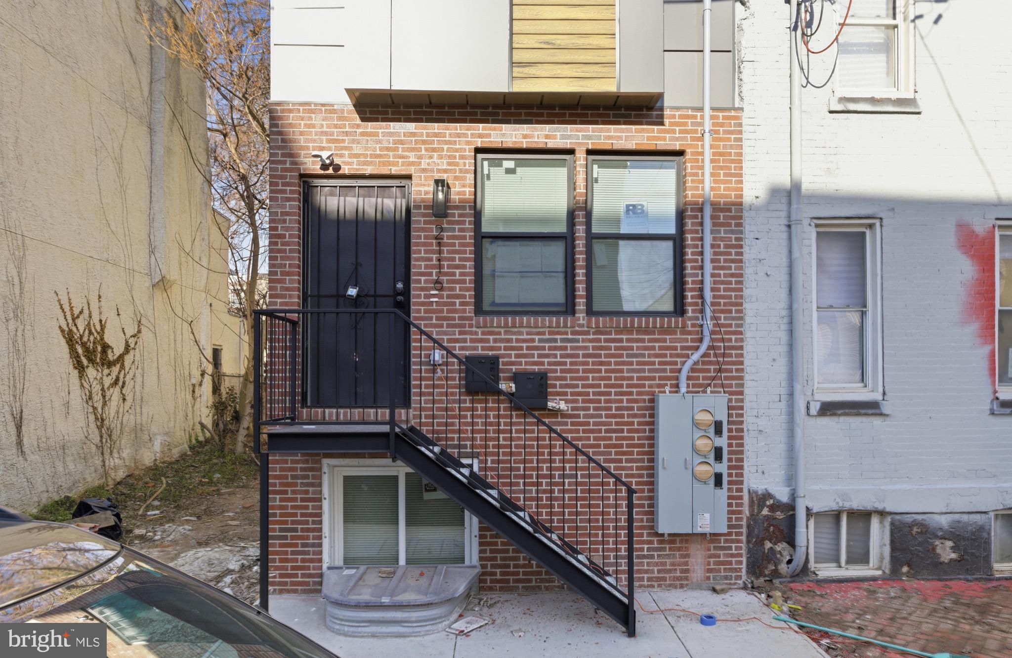 2116 North 7th Street, Unit 2 Philadelphia, PA 19122 - Photo 18 of 21 a view of a house with a door
