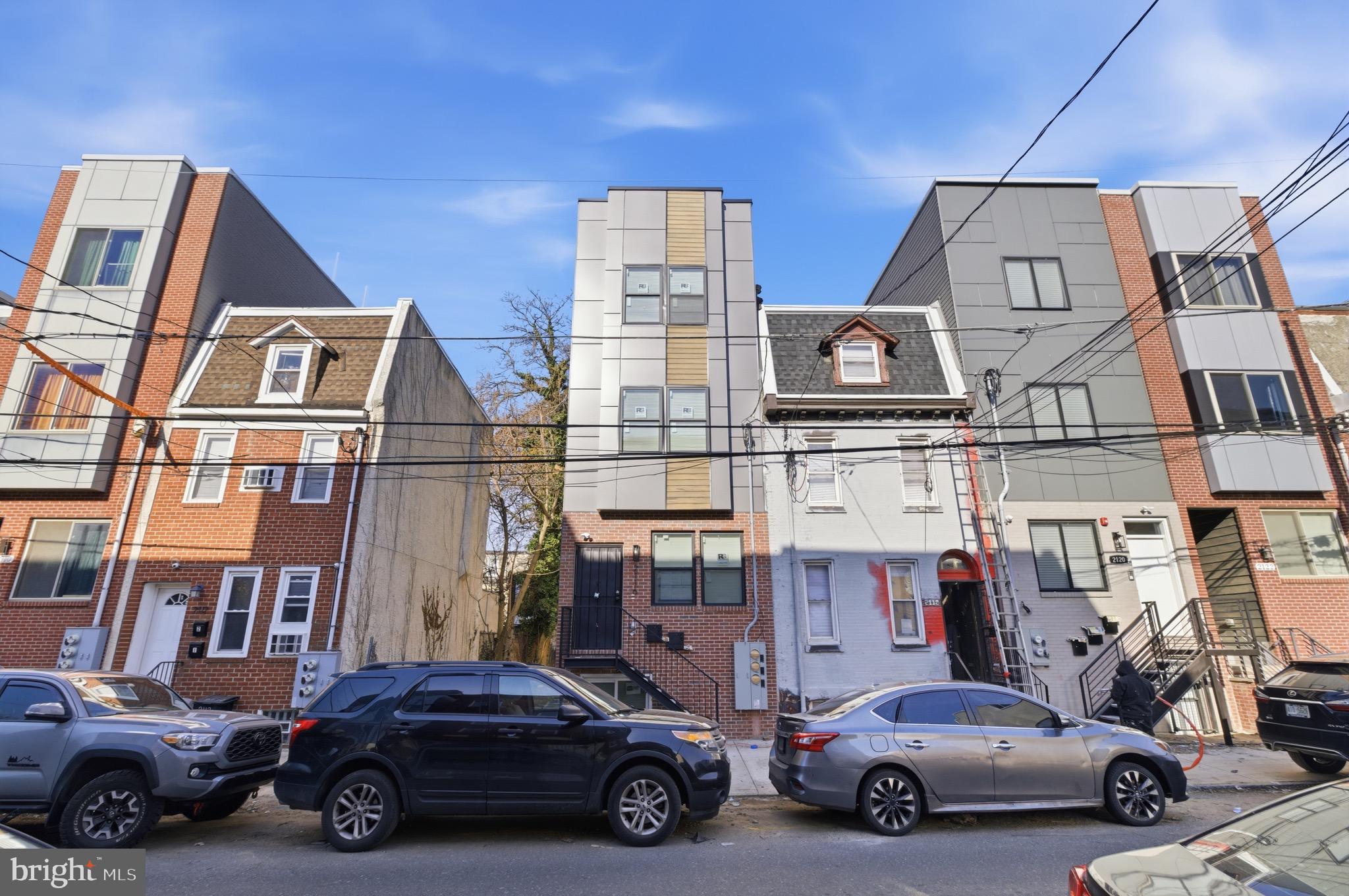 2116 North 7th Street, Unit 2 Philadelphia, PA 19122 - Photo 21 of 21 a car parked in front of a building