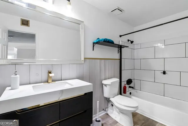 a bathroom with a sink and a toilet