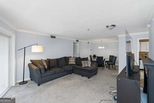 a living room with furniture and a couch