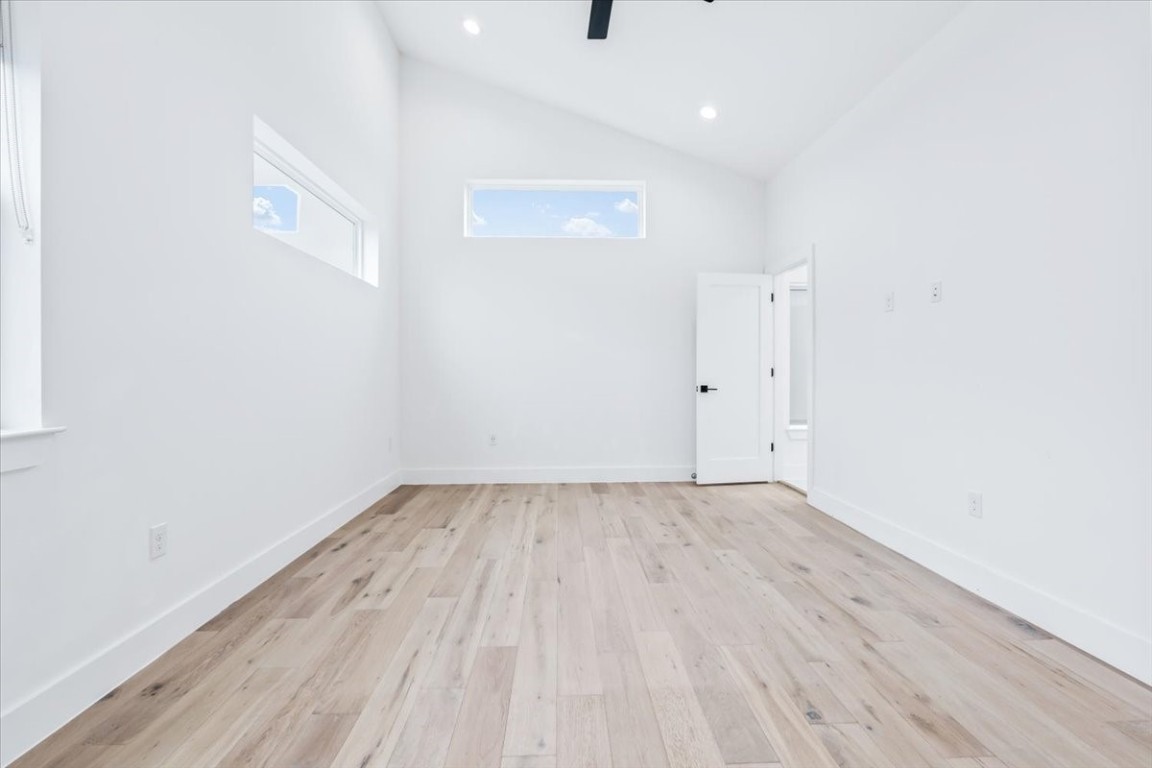 6300 Santos Street, Unit 3 Austin, TX 78741 - Photo 17 of 32 a view of an empty room with wooden floor