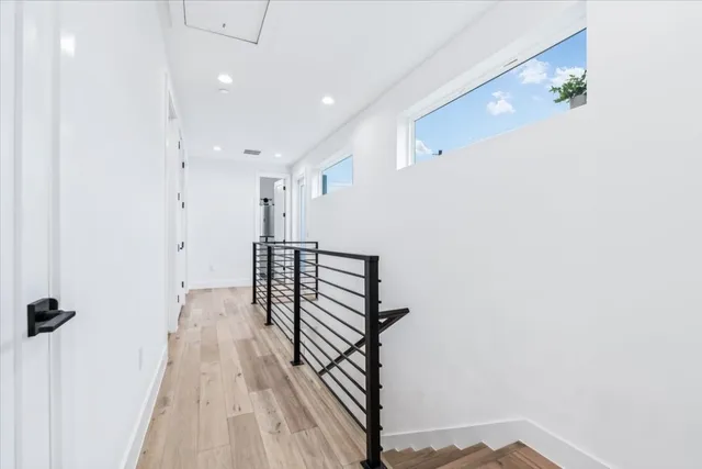 a view of entryway with wooden floor