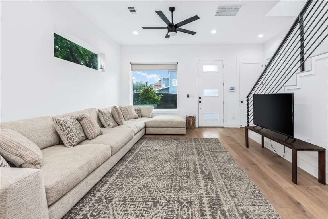 6300 Santos Street, Unit 3 Austin, TX 78741 - Photo 2 of 32 a living room with furniture and a flat screen tv