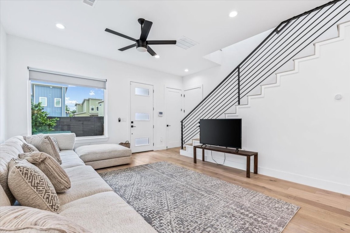 6300 Santos Street, Unit 3 Austin, TX 78741 - Photo 3 of 32 a living room with furniture and a flat screen tv