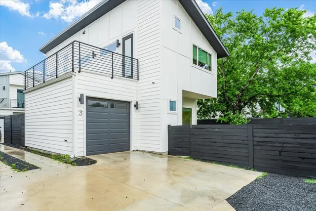 a view of a house with a garage