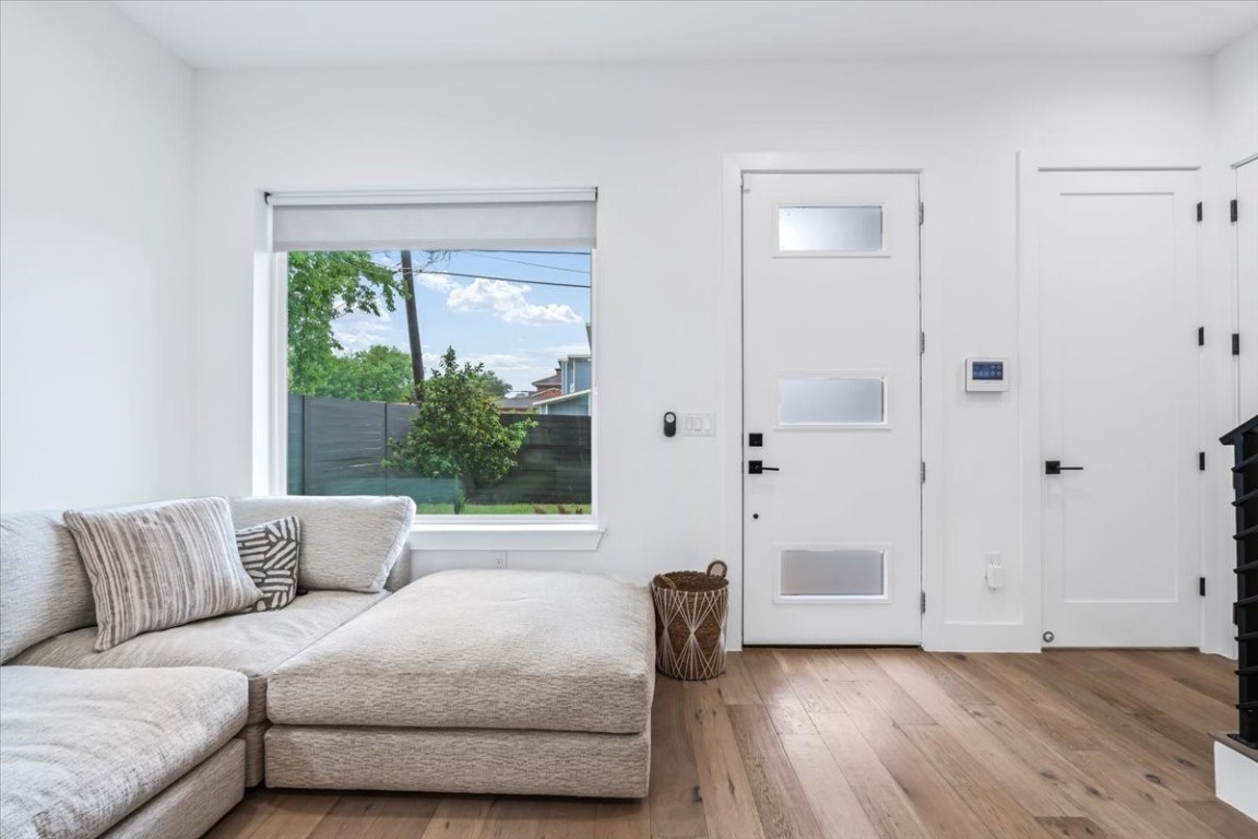 6300 Santos Street, Unit 3 Austin, TX 78741 - Photo 4 of 32 a living room with furniture and a large window