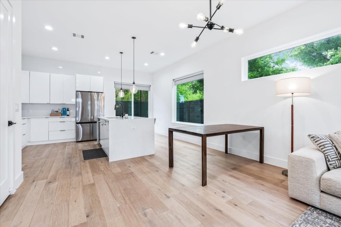 6300 Santos Street, Unit 3 Austin, TX 78741 - Photo 6 of 32 a view of kitchen with furniture and a wooden floor
