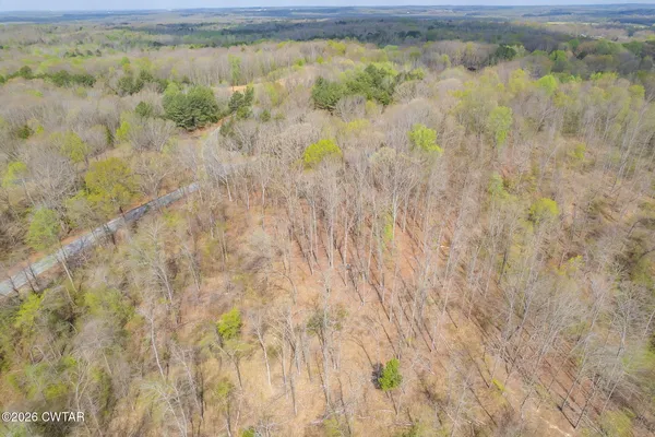 a view of lake with green space