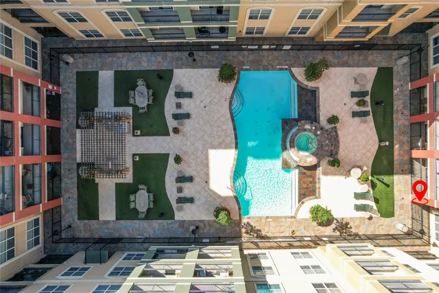 a front view of a house with lots of furniture and a kitchen