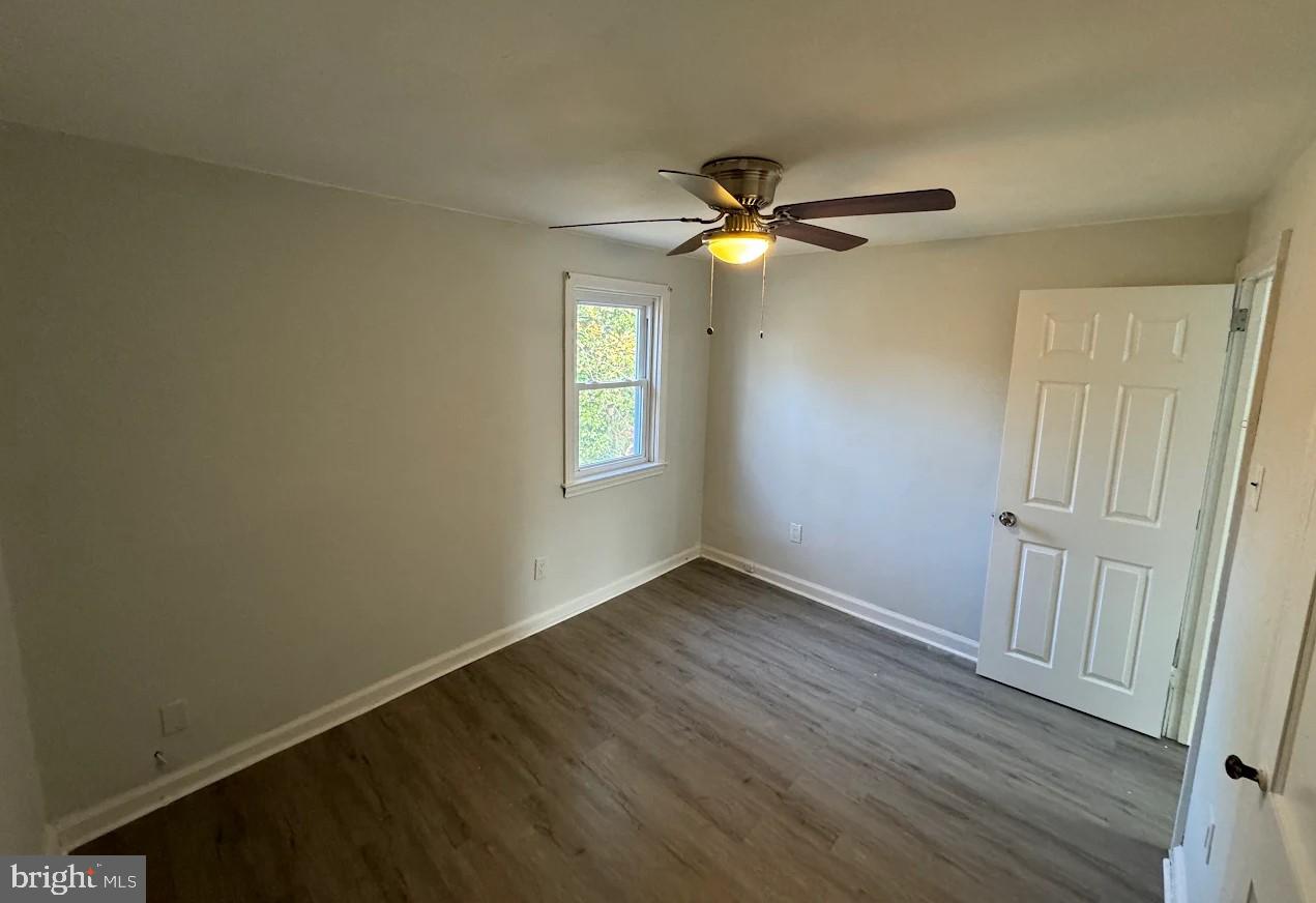 2630 McCarey Street Chester, PA 19013 - Photo 11 of 11 a view of empty room with wooden floor and fan
