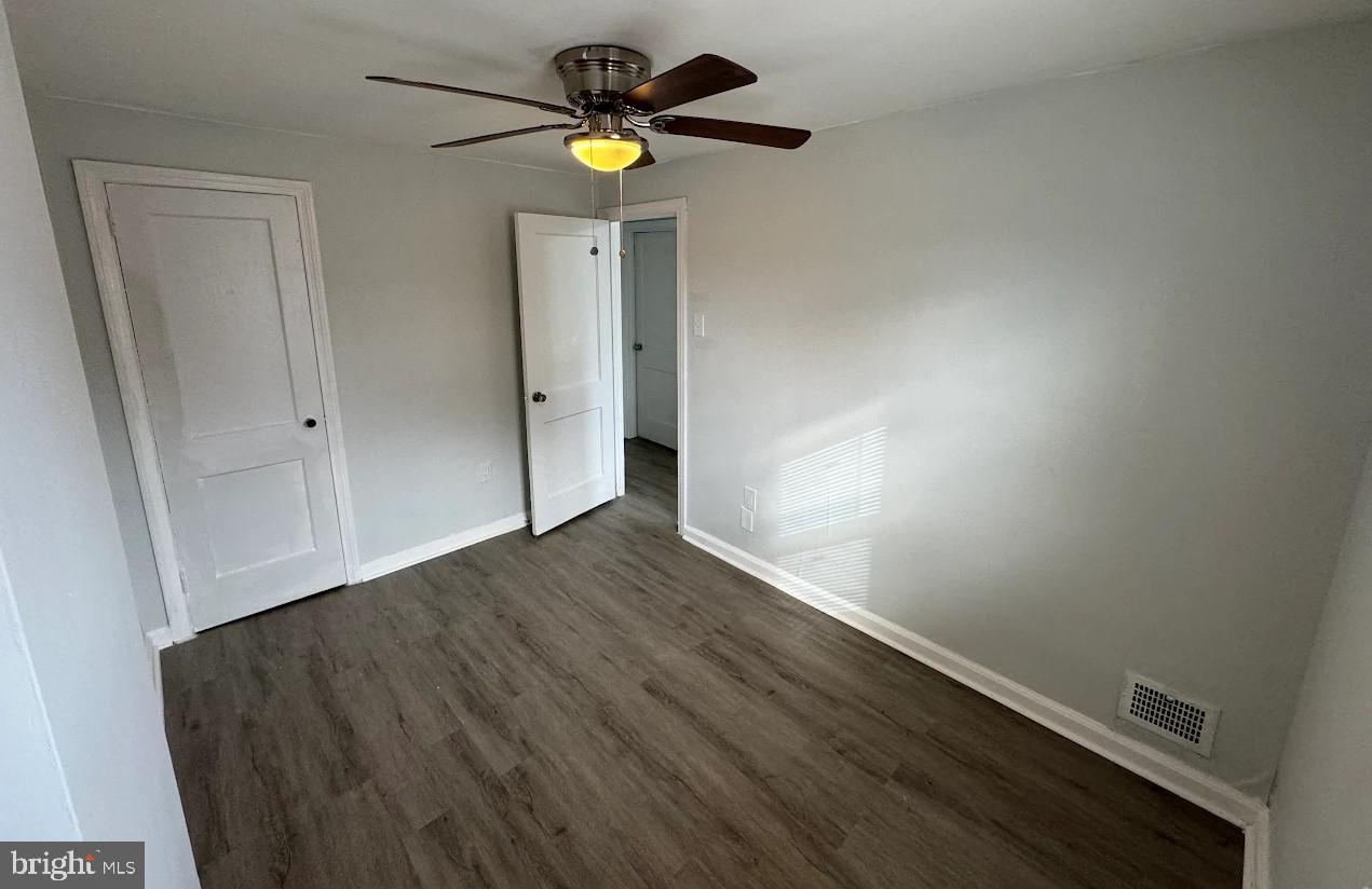 2630 McCarey Street Chester, PA 19013 - Photo 10 of 11 an empty room with wooden floor and window
