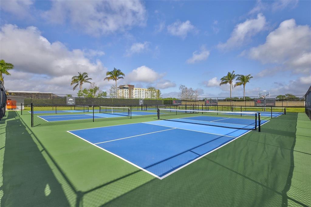140 Riviera Dunes Way, Unit 206 Palmetto, FL 34221 - Photo 40 of 46 a view of a tennis court