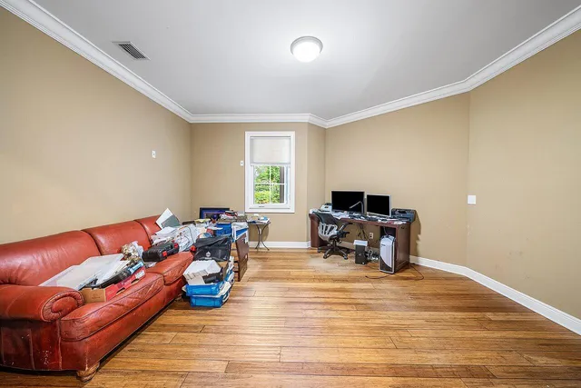 a bathroom with a sink vanity granite tub and shower