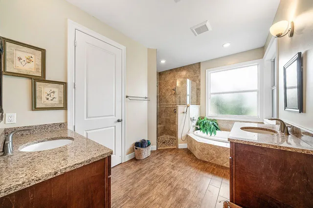 a view of a kitchen with a refrigerator and window