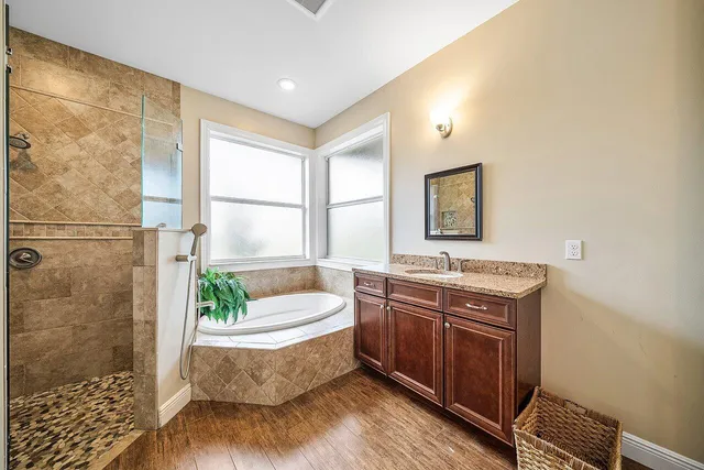 a bedroom with bed and a window