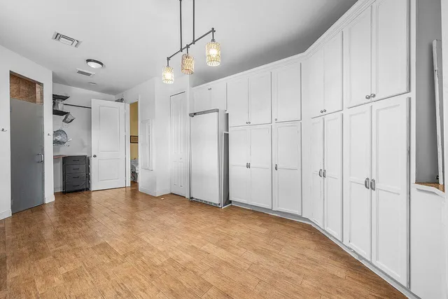 a view of a garden with a tree