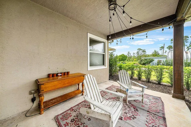 a view of swimming pool from a lake view