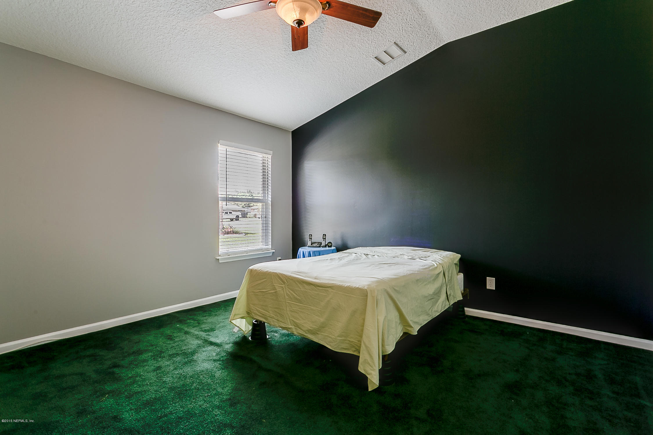 2863 Longleaf Ranch Circle Middleburg, FL 32068 - Photo 25 of 33 In-Law_Suite_Bedroom_View_2