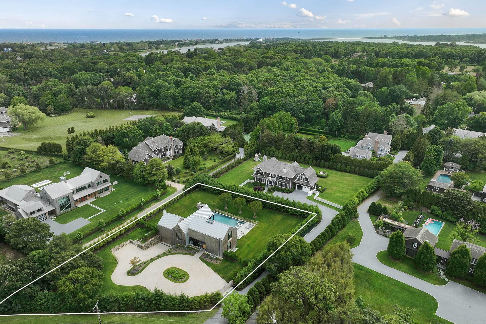 179 Montauk Highway East Hampton, NY 11937 - Photo 1 of 47 an aerial view of a house with yard