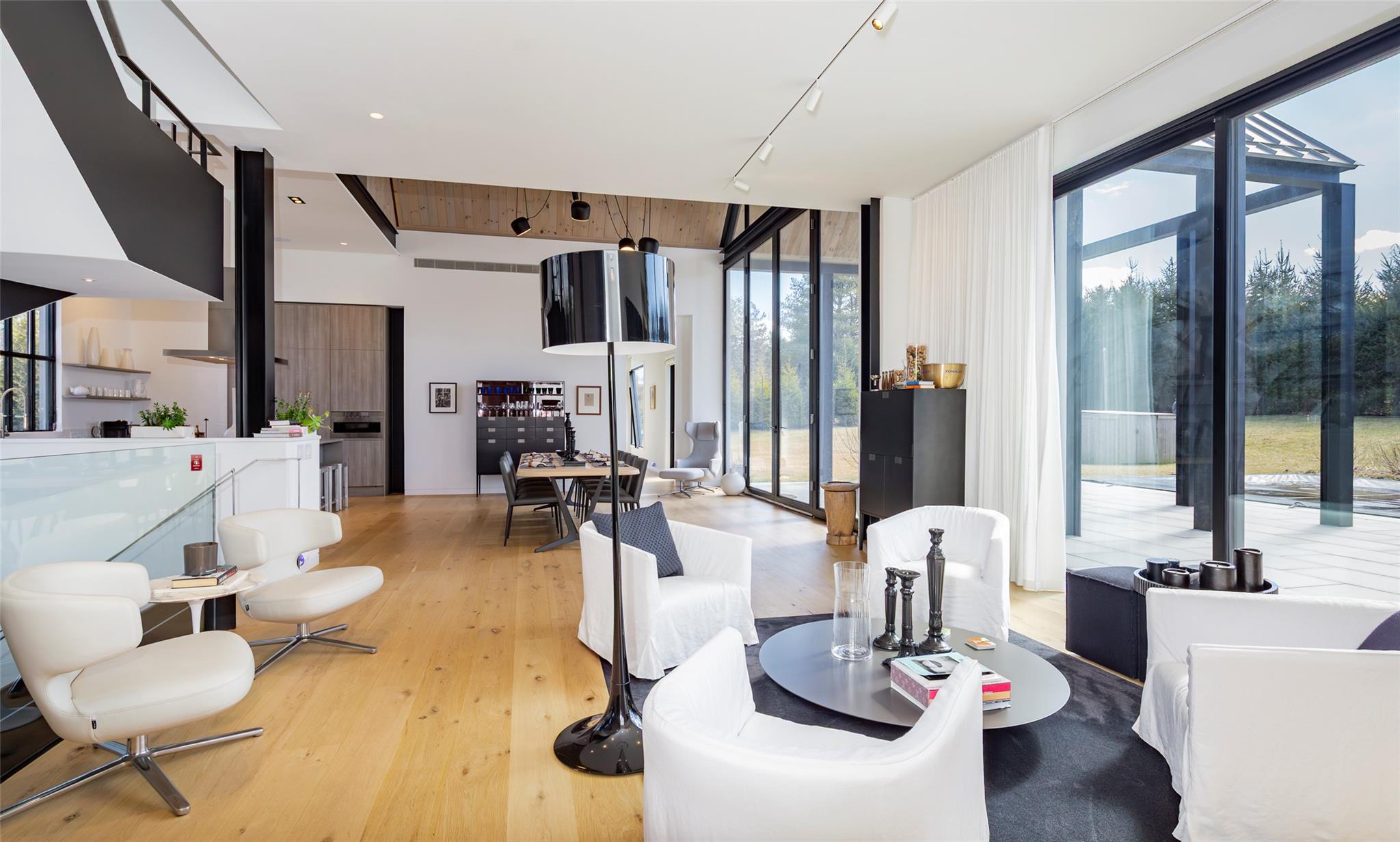 179 Montauk Highway East Hampton, NY 11937 - Photo 20 of 47 a living room with furniture and a large window