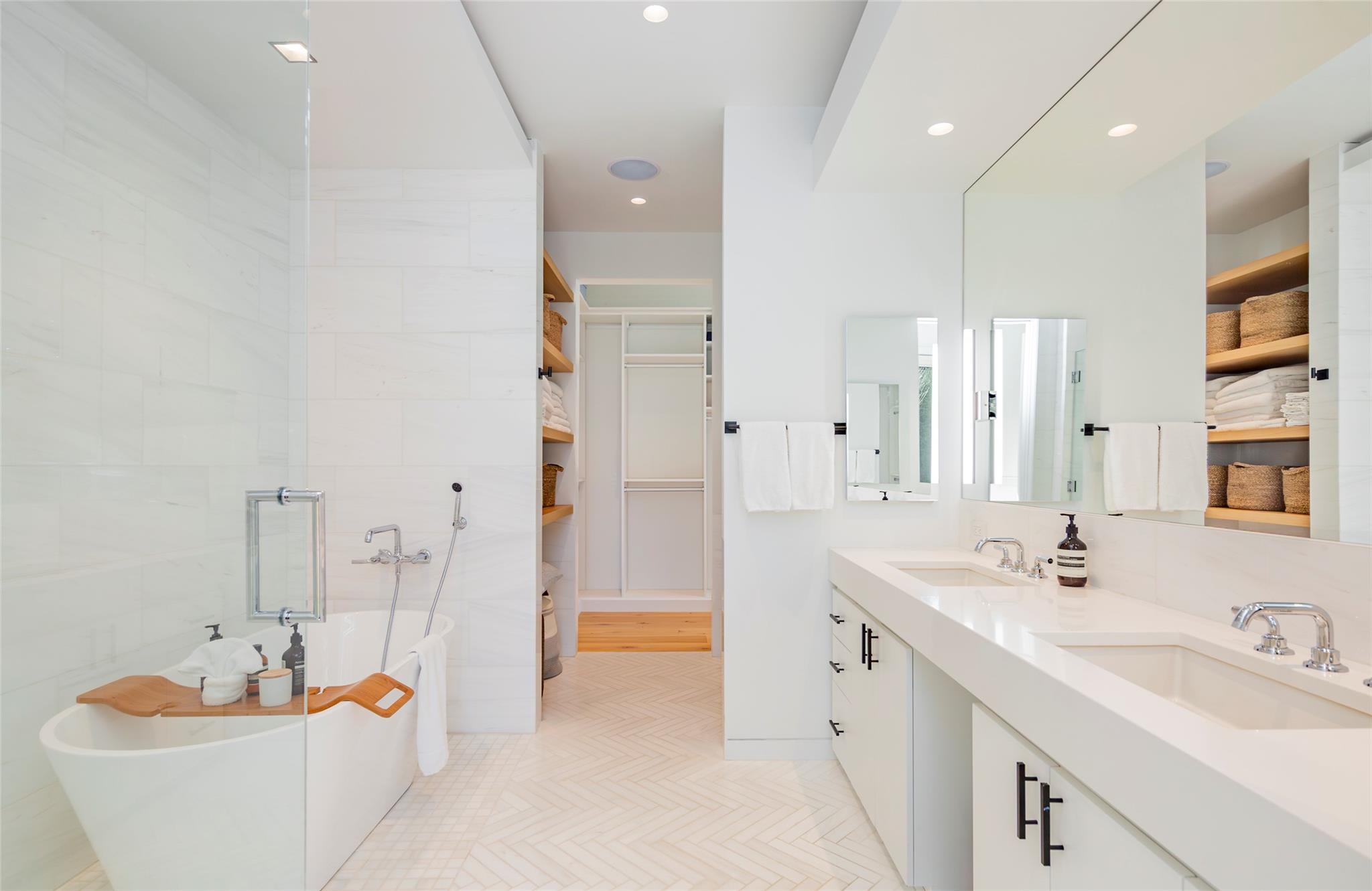179 Montauk Highway East Hampton, NY 11937 - Photo 23 of 47 a spacious bathroom with a double vanity sink tub and mirror