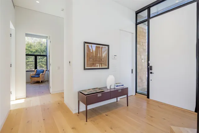 a living room with furniture and a gate