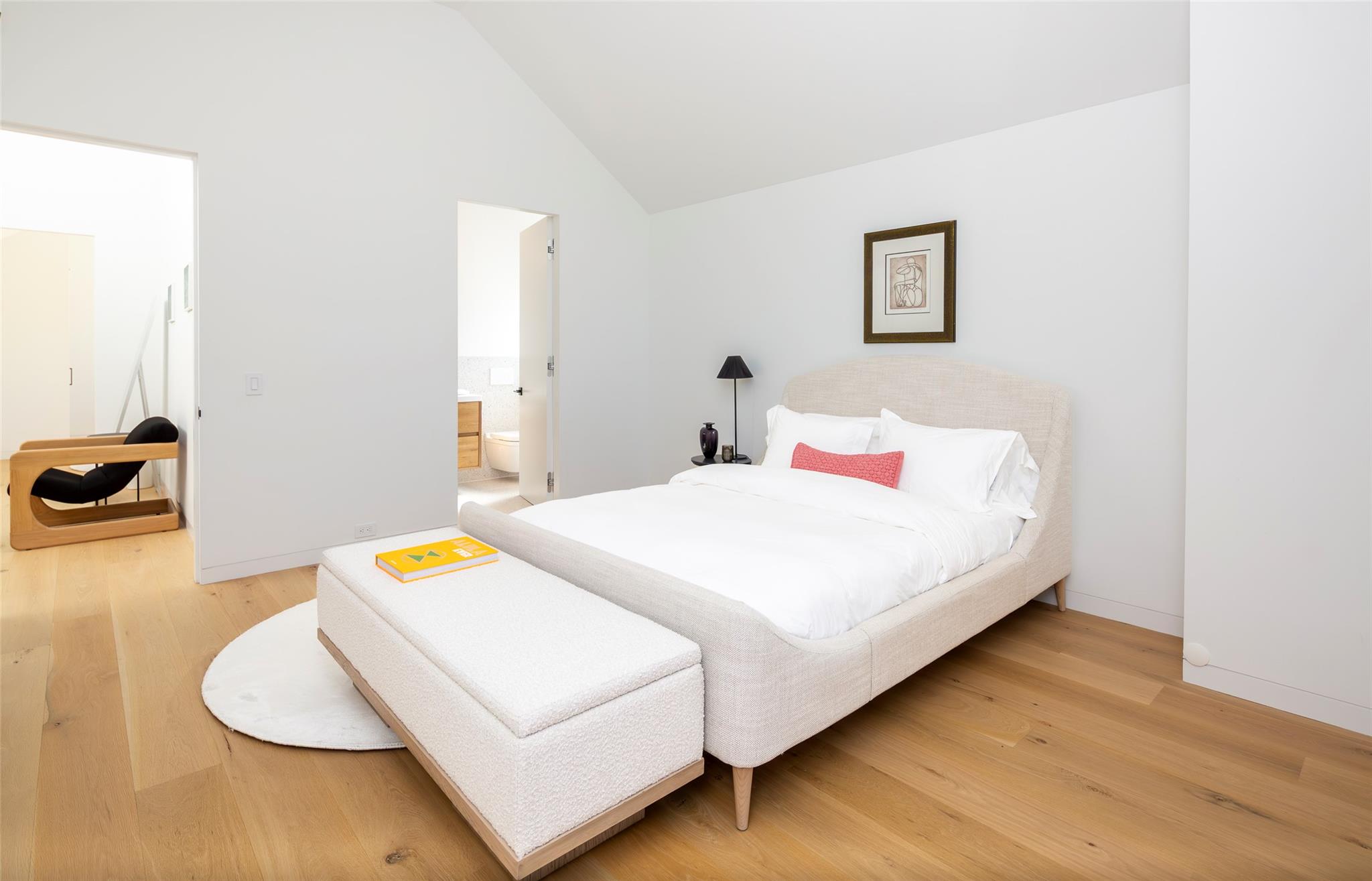 179 Montauk Highway East Hampton, NY 11937 - Photo 33 of 47 a bedroom with a bed and a couch