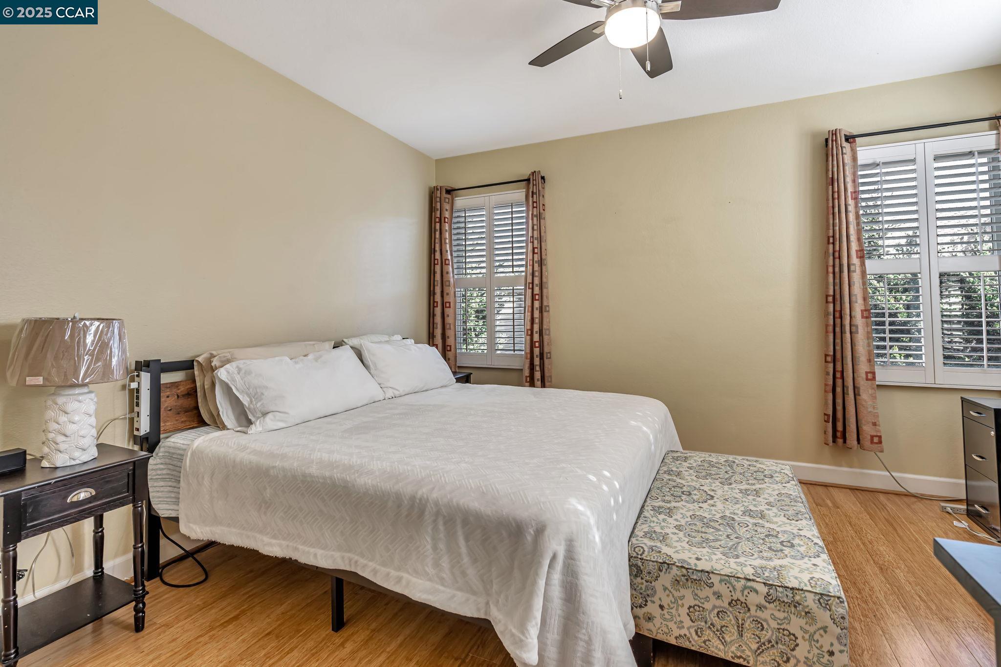 2036 Serra Lane Hercules, CA 94547 - Photo 24 of 60 a bedroom with a bed and window