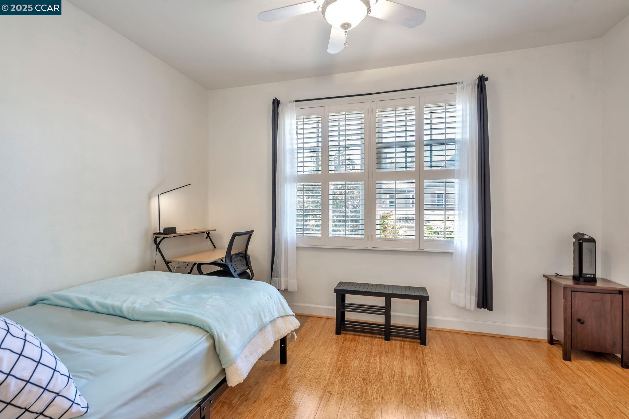 2036 Serra Lane Hercules, CA 94547 - Photo 30 of 60 a bedroom with a bed and a window