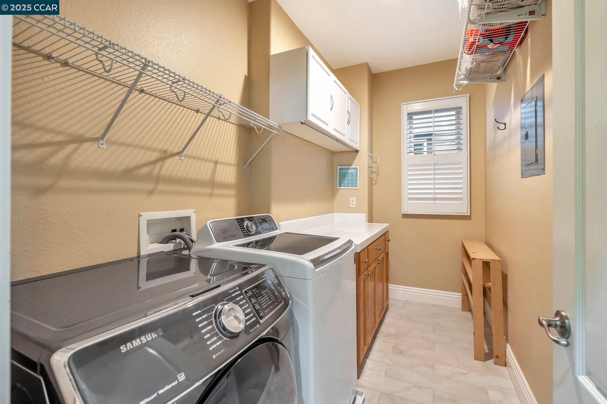 2036 Serra Lane Hercules, CA 94547 - Photo 36 of 60 a utility room with dryer and washer