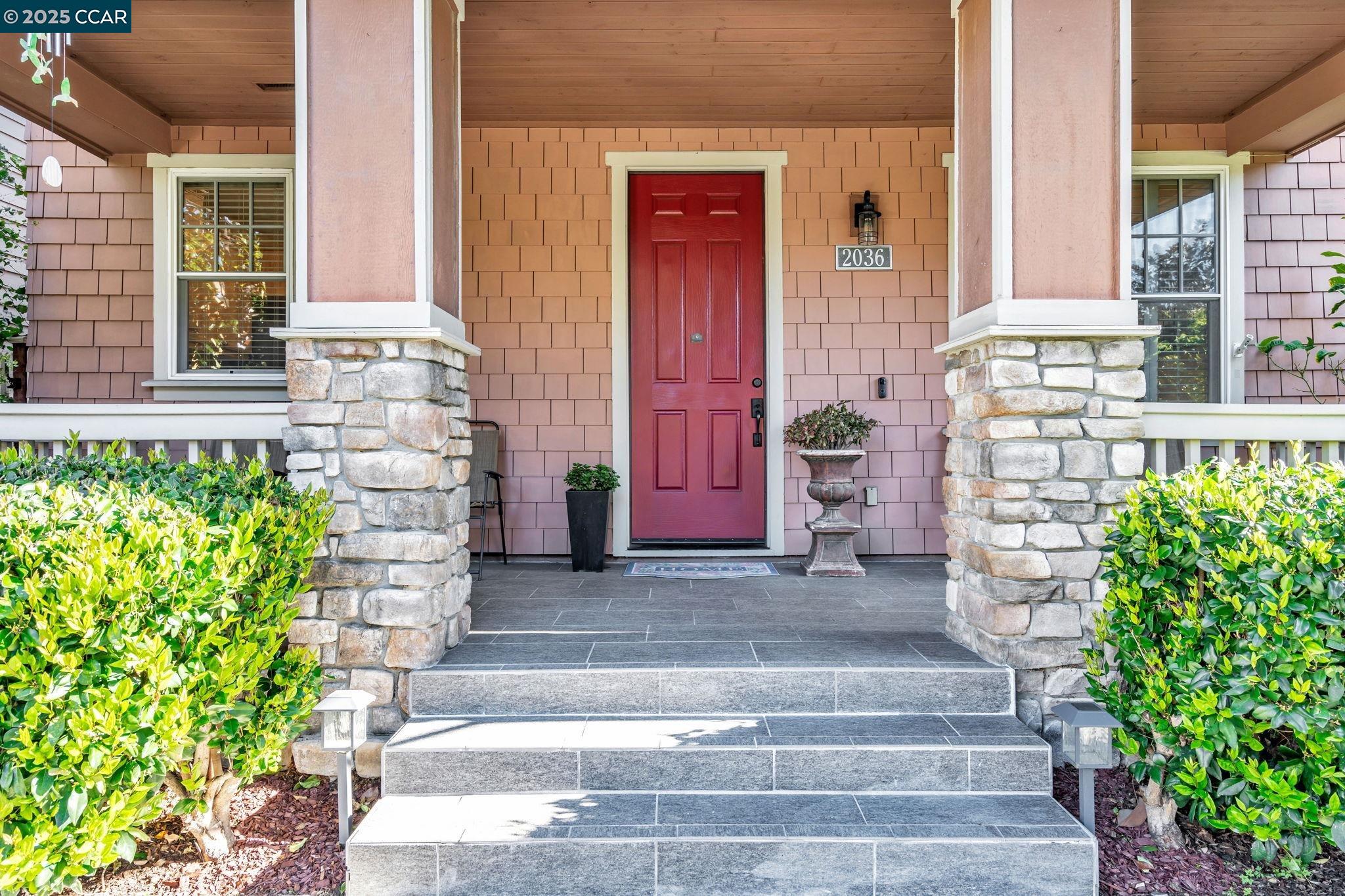 2036 Serra Lane Hercules, CA 94547 - Photo 4 of 60 a front view of a house with a garden