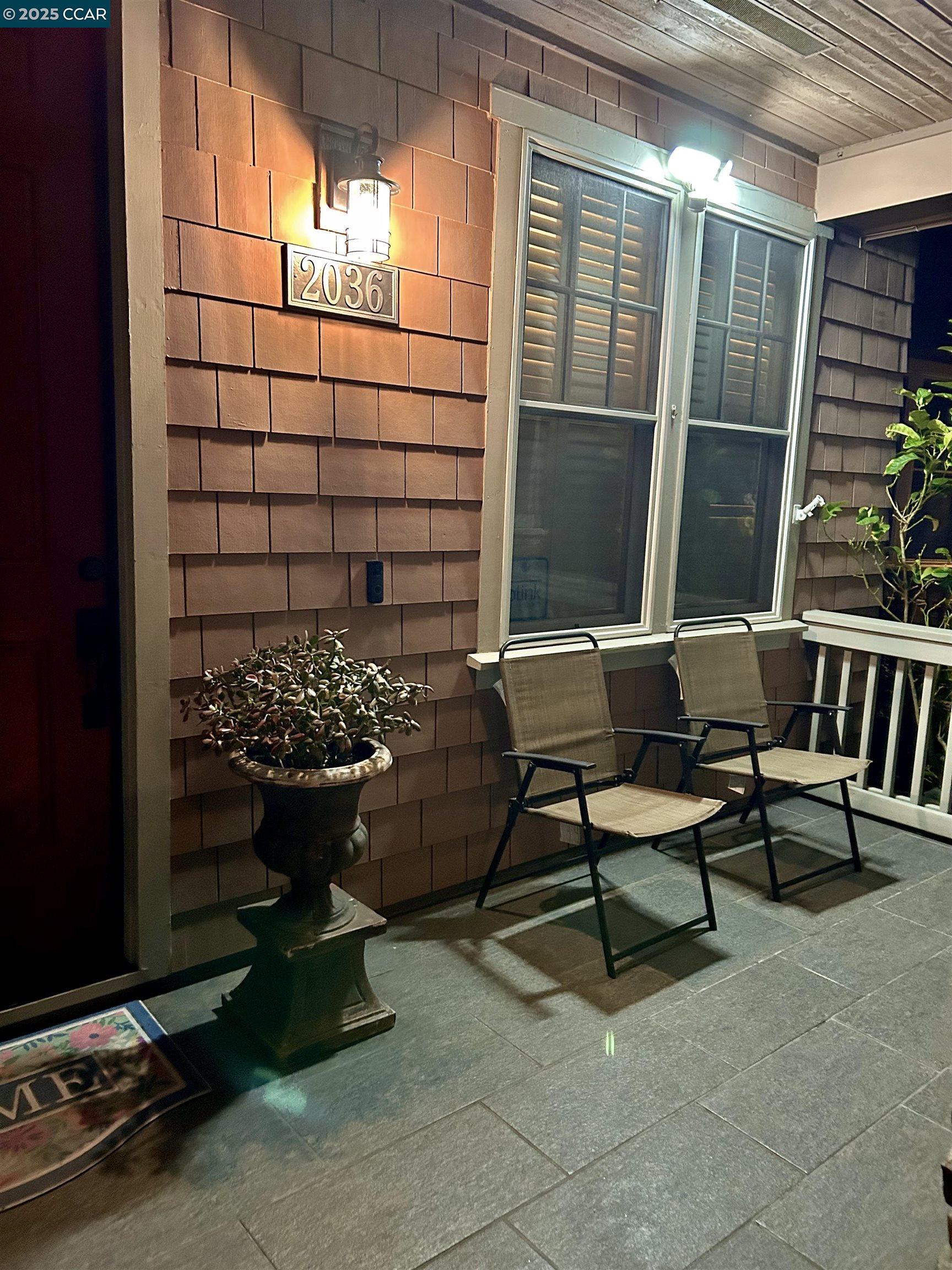 2036 Serra Lane Hercules, CA 94547 - Photo 43 of 60 a building outdoor space with patio furniture and potted plants