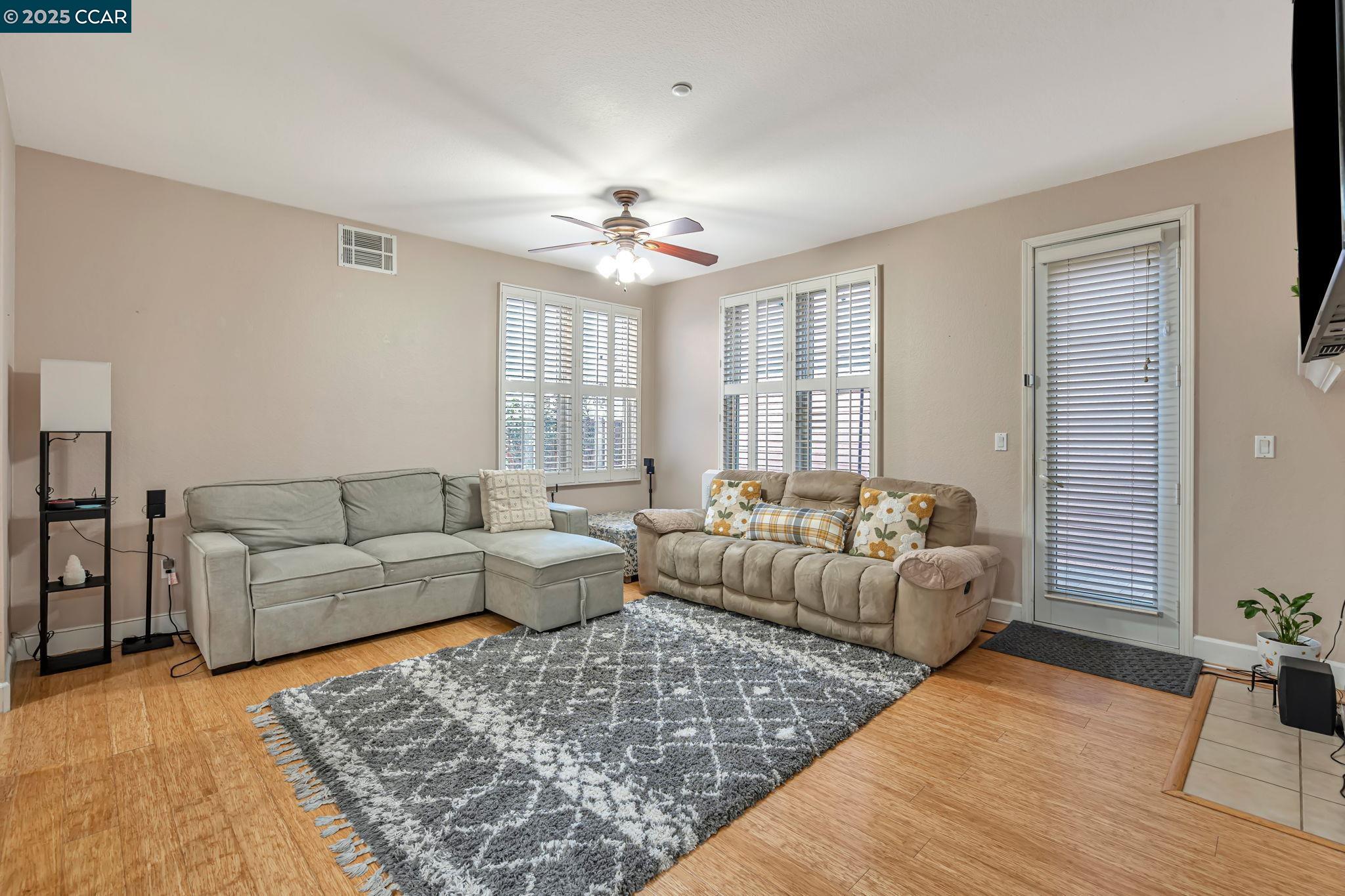 2036 Serra Lane Hercules, CA 94547 - Photo 10 of 60 a living room with furniture and a rug