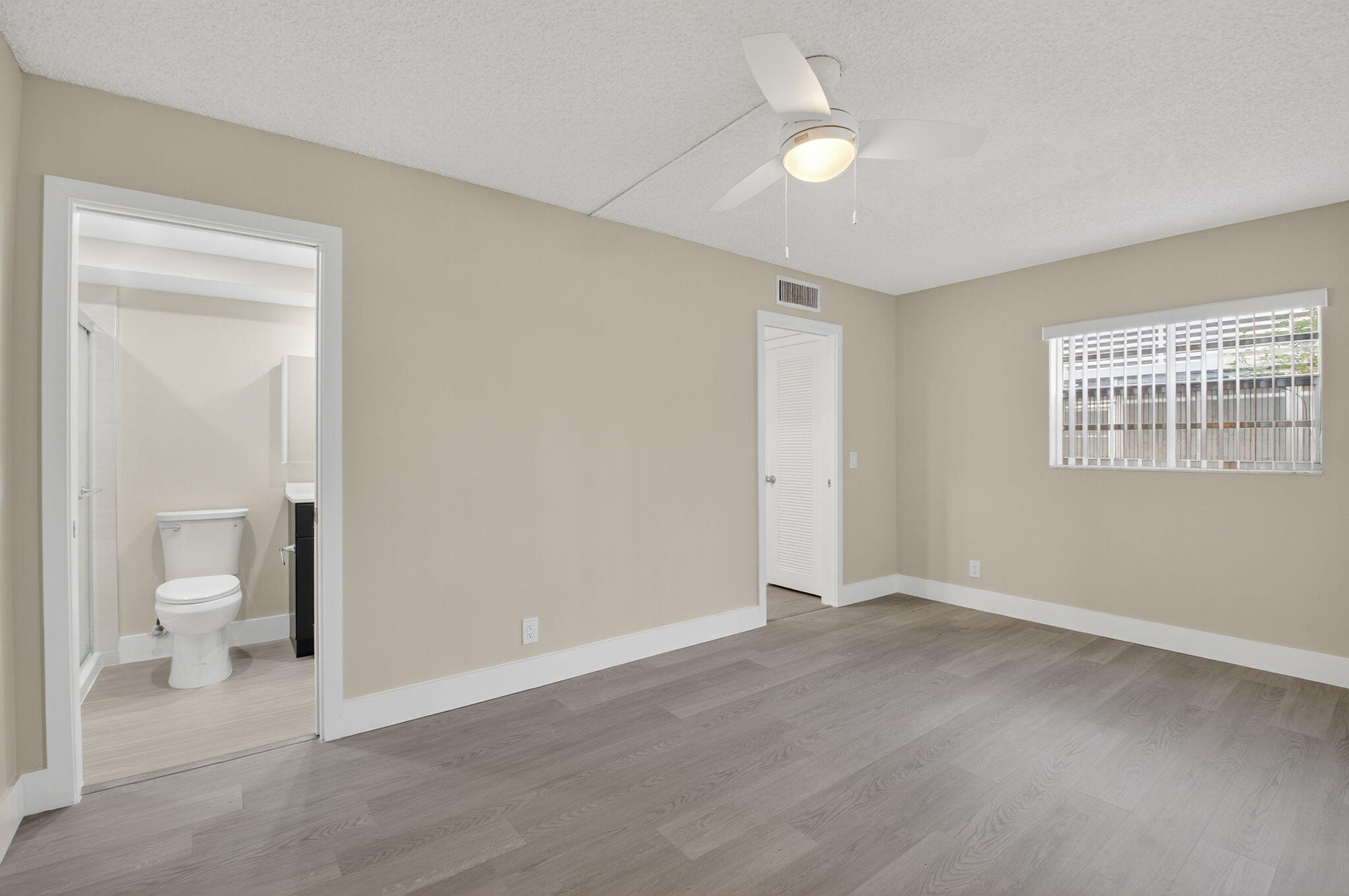538 Normandy Lane Delray Beach, FL 33484 - Photo 12 of 66 a view of an empty room with a window