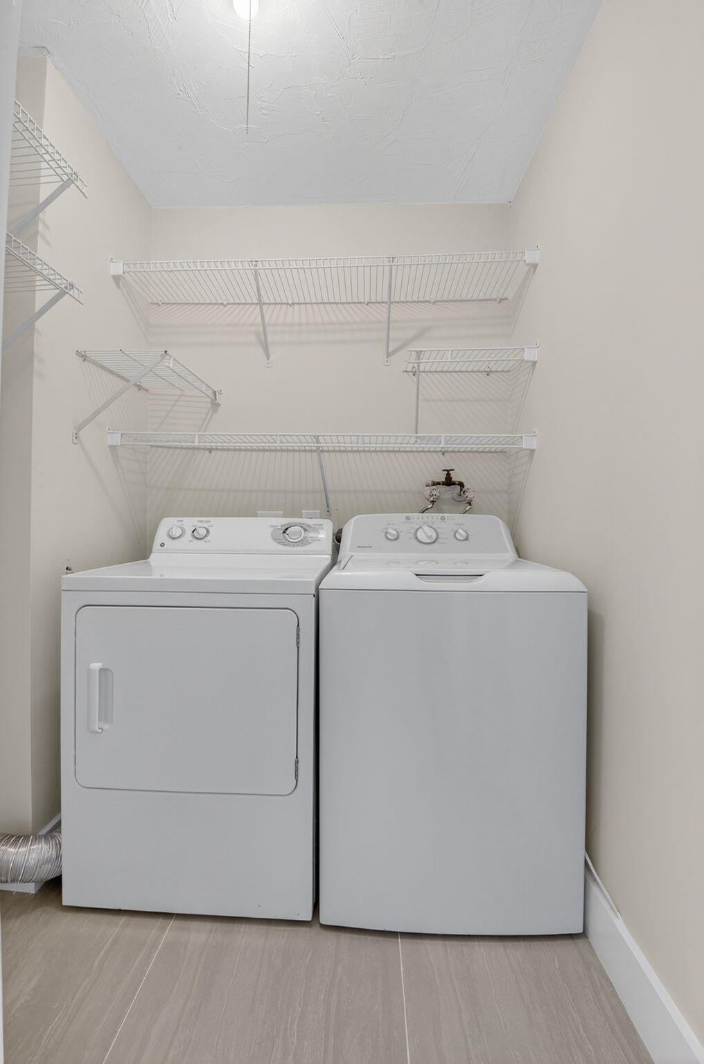 538 Normandy Lane Delray Beach, FL 33484 - Photo 19 of 66 a utility room with dryer and washer