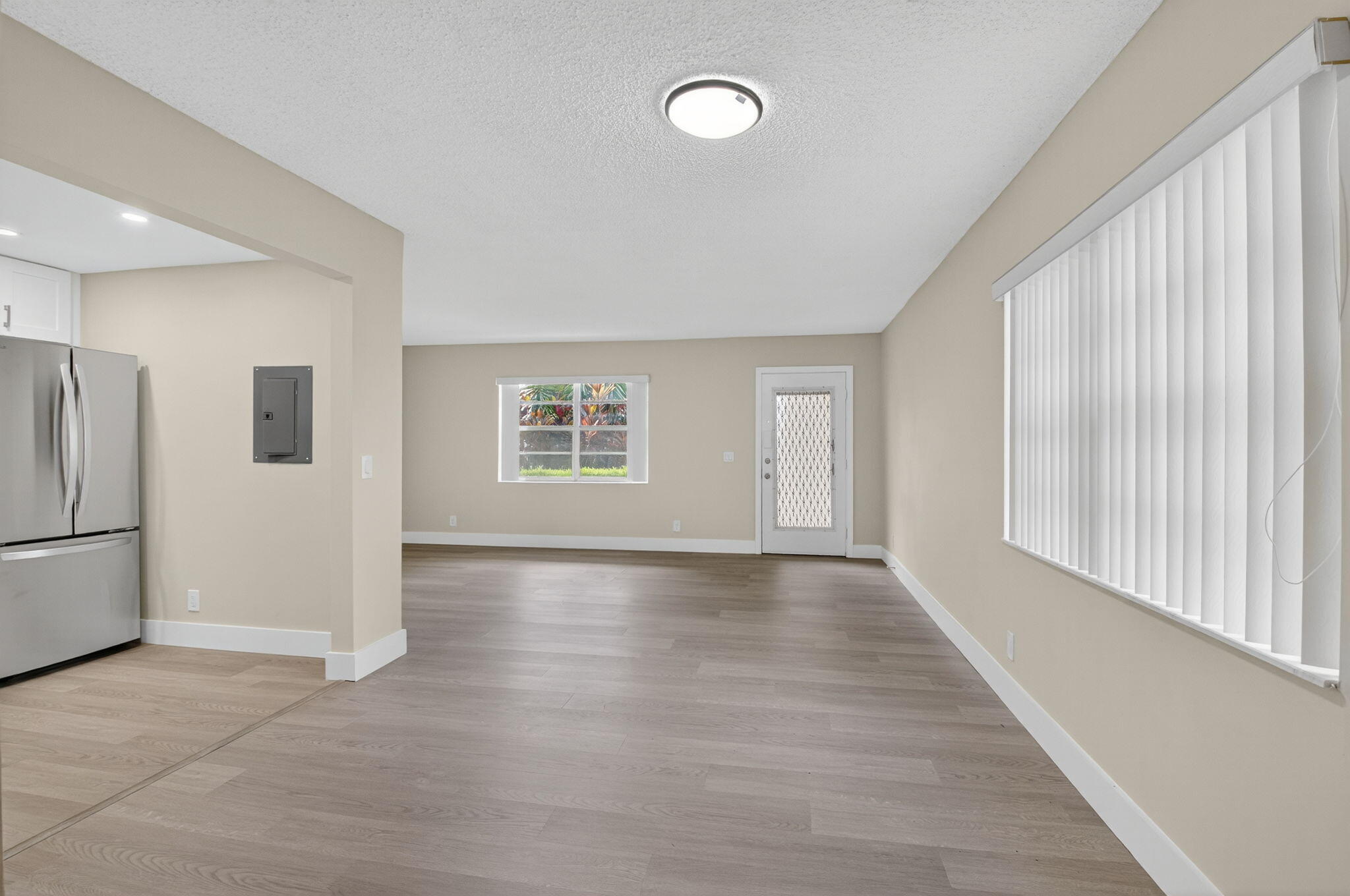 538 Normandy Lane Delray Beach, FL 33484 - Photo 8 of 66 a view of an empty room with a window