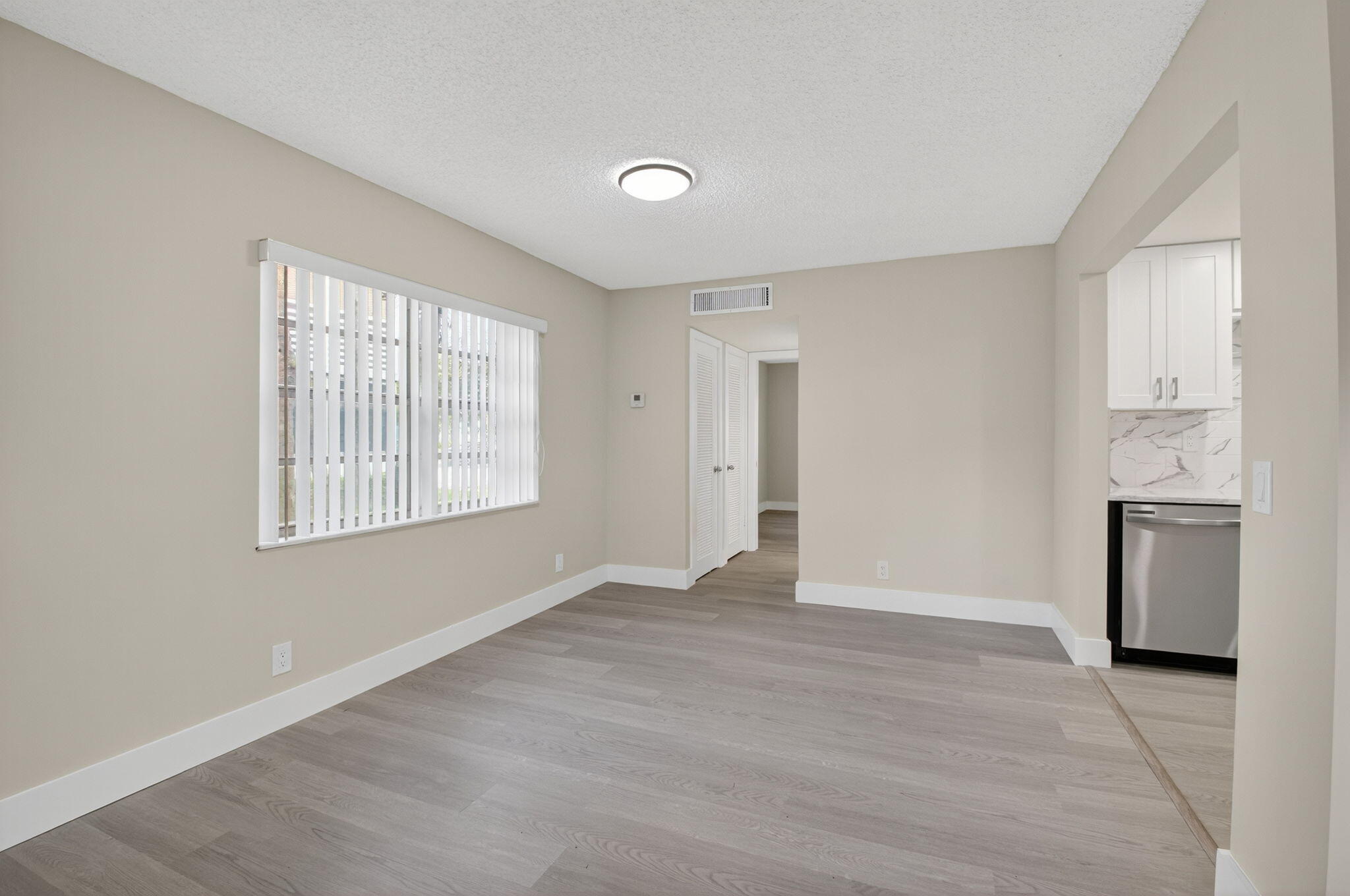 538 Normandy Lane Delray Beach, FL 33484 - Photo 9 of 66 a view of an empty room with a window