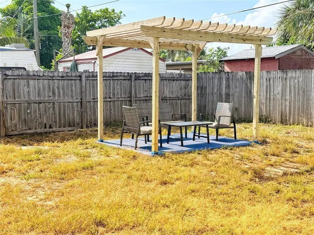 a view of a swimming pool with a lounge chair
