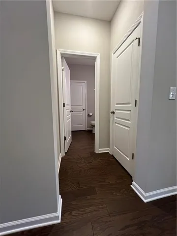 a kitchen with stainless steel appliances granite countertop a refrigerator sink and cabinets