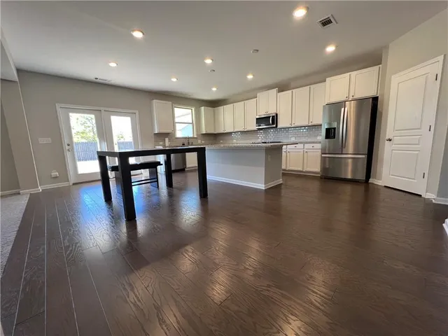a bathroom with a toilet and a sink