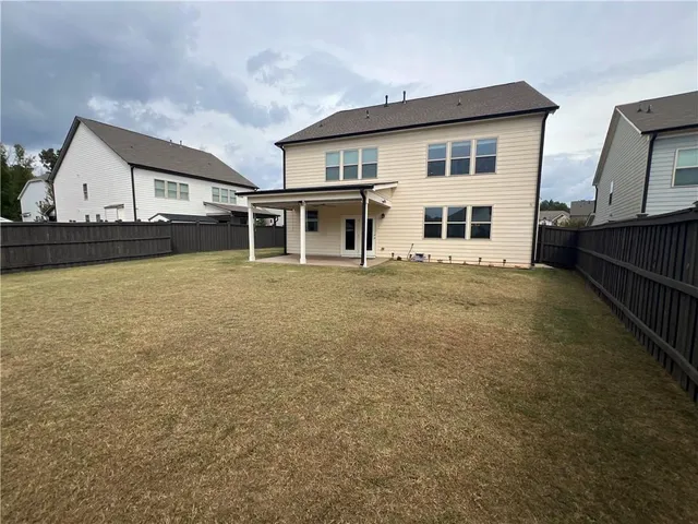 a house view with a outdoor space